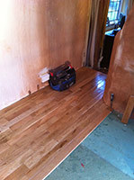 New oak flooring going down in utility room conversion (Northchapel)